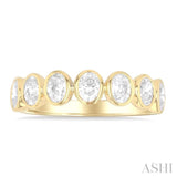 1 1/2 Ctw 7-Stone Bezel Set Oval Cut Diamond Fashion Band in 14K Yellow Gold