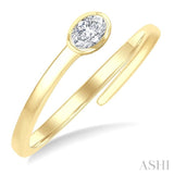 1/6 Ctw Bypass Bezel Set Oval Cut Diamond Open Fashion Ring in 14K Yellow Gold