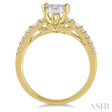 7/8 ctw Round and Baguette Diamond Lovebright Engagement Ring in 14K Yellow and White gold
