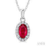 5x3 MM Oval Shape Ruby and 1/20 Ctw Round Cut Diamond Halo Precious Pendant with Chain in 10K White Gold