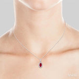 5x3 MM Oval Shape Ruby and 1/20 Ctw Round Cut Diamond Halo Precious Pendant with Chain in 10K White Gold