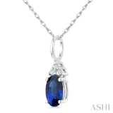 1/50 Ctw Oval Cut 6X4 MM Sapphire and Round Cut Diamond Precious Pendant With Chain in 10K White Gold