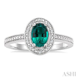 7X5 MM Oval Shape Lab-Created Emerald and 1/50 Ctw Round Cut Diamond Precious Ring in Sterling Silver