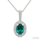 7X5 MM Oval Shape Lab-Created Emerald and 1/50 Ctw Round Cut Diamond Precious Pendant With Chain in Sterling Silver