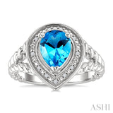 9X6MM Pear Cut Blue Topaz and 1/20 Ctw Round Cut Diamond Semi-Precious Ring in Sterling Silver