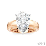 1/8 Ctw Pear Shape Round Cut Diamond Semi-Mount Engagement Ring in 14K Rose and White Gold