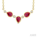 4X3MM Pear Cut Ruby and 1/50 Ctw Bezel Set Round Cut Diamond Precious Fashion Necklace in 10K Yellow Gold