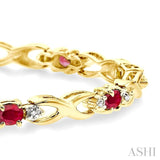 4x3 MM Oval Cut Ruby and 1/10 ctw Single Cut Diamond Bracelet in 10K Yellow Gold