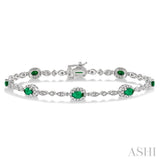 5x3 MM Oval Cut Emerald and 1/20 ctw Single Cut Diamond Bracelet in 10K White Gold