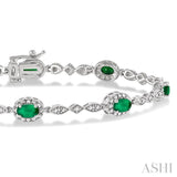 5x3 MM Oval Cut Emerald and 1/20 ctw Single Cut Diamond Bracelet in 10K White Gold