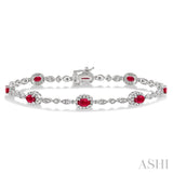 5x3 MM Oval Cut Ruby and 1/20 Ctw Round Cut Diamond Bracelet in 14K White Gold
