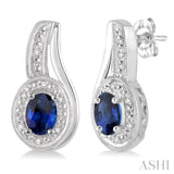 5x3 MM Oval Cut Sapphire and 1/50 ctw Round Cut Diamond Earrings in Sterling Silver