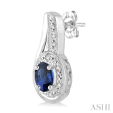 5x3 MM Oval Cut Sapphire and 1/50 ctw Round Cut Diamond Earrings in Sterling Silver