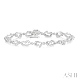 1/20 Ctw Heart Shape Round Cut Diamond Bracelet in Sterling Silver