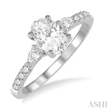7/8 Ctw Pear & Round Cut Diamond Engagement Ring With 1/2 Ct Oval Cut Center Stone in 14K White Gold