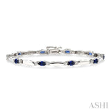 5x3 MM Oval Cut Sapphire and 1/10 ctw Bar and Oval Mount Round Cut Diamond Precious Bracelet in 10K White Gold