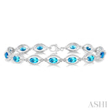 6x4 MM Oval Cut Blue Topaz and 1/10 Ctw Round Cut Diamond Semi-Precious Bracelet in Sterling Silver