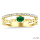 4x3 MM Oval Shape Emerald and 1/5 Ctw Round Cut Diamond Precious Fashion Split Twin Ring in 10K Yellow Gold