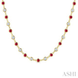 2.85 MM Round Shape Ruby and 2 5/8 Ctw Bezel Set Round Cut Diamond Precious Station Necklace in 14K Yellow Gold
