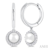 5.5 MM Round Shape Cultured Pearl and 1/8 ctw Petite Round Cut Diamond Halo Fashion Huggies in 10K White Gold