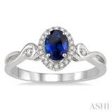 6x4 MM Oval Cut Sapphire and 1/10 ctw Round Cut Diamond Ring in 14K White Gold