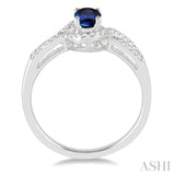 6x4 MM Oval Cut Sapphire and 1/6 ctw Round Cut Diamond Ring in 14K White Gold