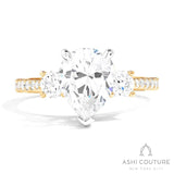 Bridal 3-Stone Diamond Pear Semi-Mount Engagement Ring With Round Side Diamonds in Yellow and White Gold