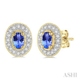 5x3mm Oval Cut Tanzanite and 1/4 Ctw Round Cut Diamond Earrings in 14K Yellow Gold