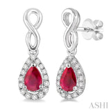 5x3 MM Pear Shape Ruby and 1/6 Ctw Round Cut Diamond Earrings in 14K White Gold
