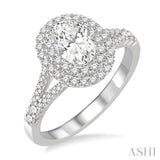1 Ctw Diamond Engagement Ring with 1/2 Ct Oval Cut Center Stone in 14K White Gold