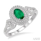 1/3 Ctw Oval Shape 6x4mm Emerald & Round Cut Diamond Precious Ring in 14K White Gold