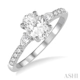 7/8 ctw Pear & Round Cut Diamond Engagement Ring With 1/2 ct Oval Cut Center Stone in 14K White Gold