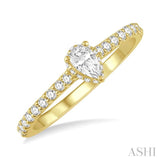 1/2 ctw Round Cut Diamond Engagement Ring With 1/4 ctw Pear Cut Center Stone in 14K Yellow Gold