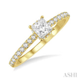 1/2 ctw Round Cut Diamond Engagement Ring With 1/4 ctw Princess Cut Center Stone in 14K Yellow Gold