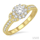 1/2 Ctw Diamond Engagement Ring with 1/5 Ct Round Cut Center Stone in 14K Yellow and White Gold