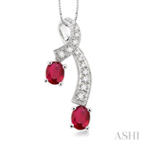5x4MM Oval Cut Ruby and 1/6 Ctw Round Cut Diamond Pendant in 14K White Gold with Chain